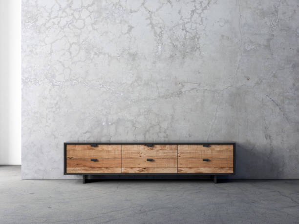istock Modern bureau or tv console mockup in empty living room with concrete wall 1194088445