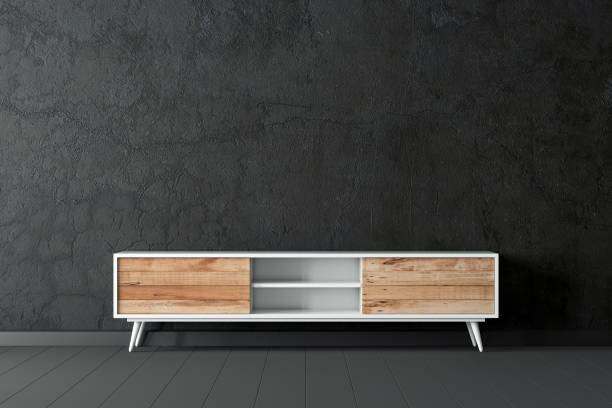 istock Modern bureau tv console mockup in empty living room with black wall 1194088446