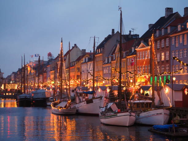 istock Nyhaven at dusk with christmas lights 1194089958