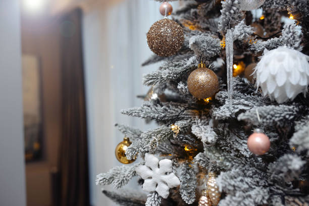 istock Christmas artificial tree with white snow and decorations toys. 1194091697