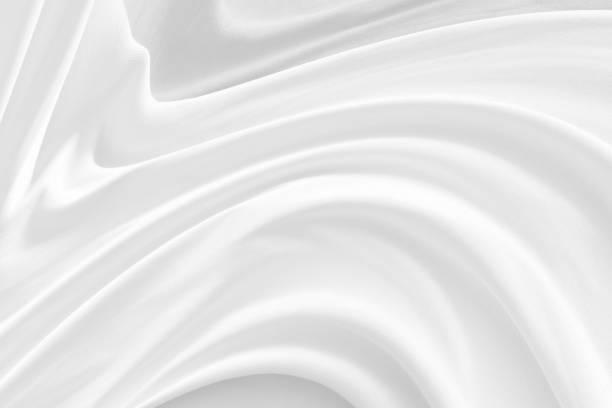 istock soft white fabric curve beauty texture background 1194094102
