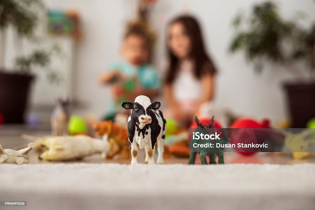 Plastic Zoo Animal Toys Stock Photo - Download Image Now - Toy Animal, Cow,  Child - iStock