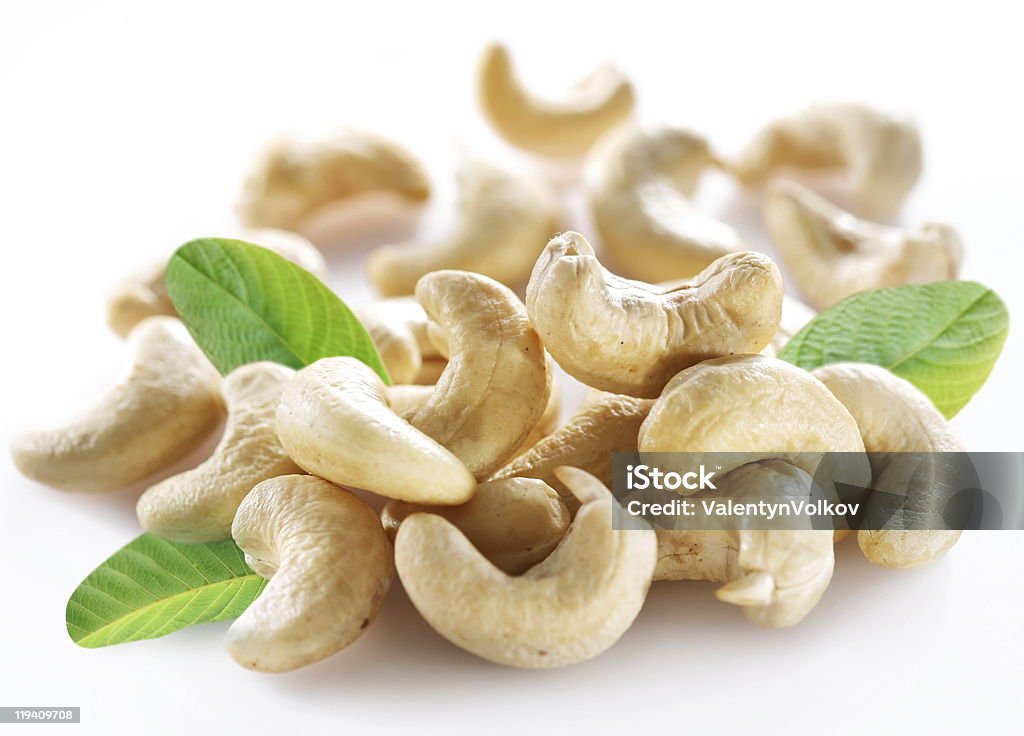 Ripe cashew nuts with leaves.  Cashew Stock Photo