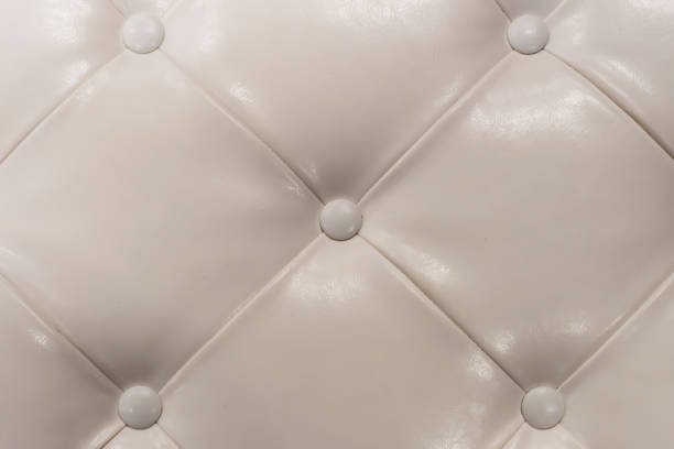 istock Part of light leather sofa. Textured background 1194098237