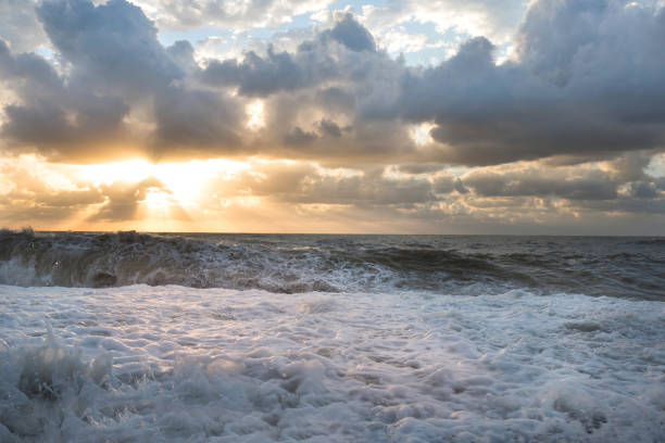 istock Sea storm on a sunset. 1194098735