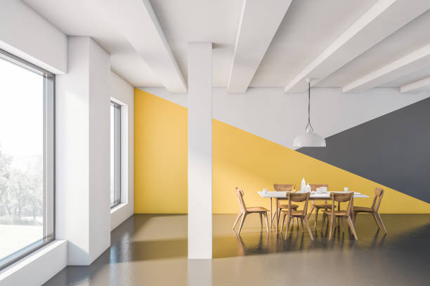 istock Yellow, white and gray loft dining room 1194102194