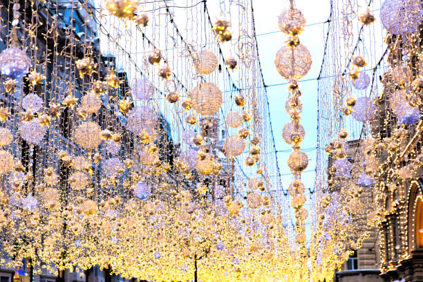 istock Christmas bright garlands and flashlights on a city stree 1194103295