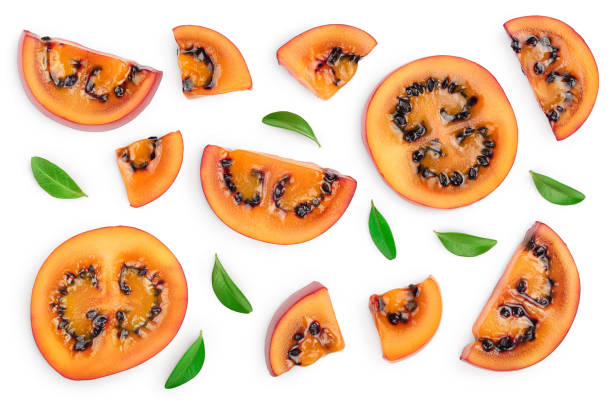 istock Fresh tamarillo fruit slices with leaves isolated on white background. Top view. Flat lay. Set or collection 1194103792