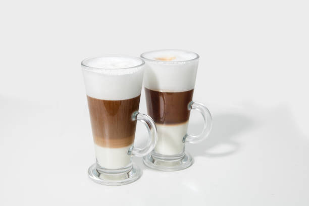 istock two glasses of coffee cocktail on white background 1194107611