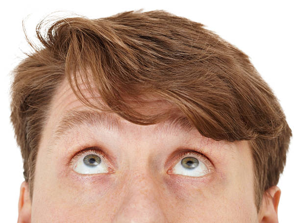 istock Eyes of man look upwards, close up 119410853