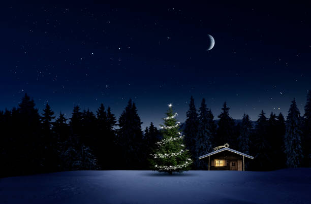istock Christmas illuminated hut in cold winter night 1194118124