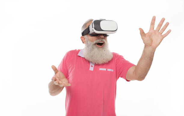 istock Bearded senior man with virtual glasses. 1194118164