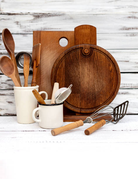istock Vintage old baking utensils on a white wooden background. 1194119600