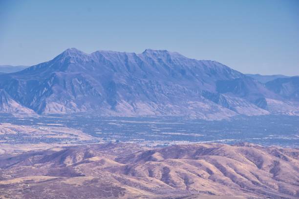 istock Wasatch Front Rocky Mountain landscapes from Oquirrh range looking at Utah Lake during fall. Panorama views near Provo, Timpanogos, Lone and Twin Peaks. Salt Lake City. United States. 1194120758