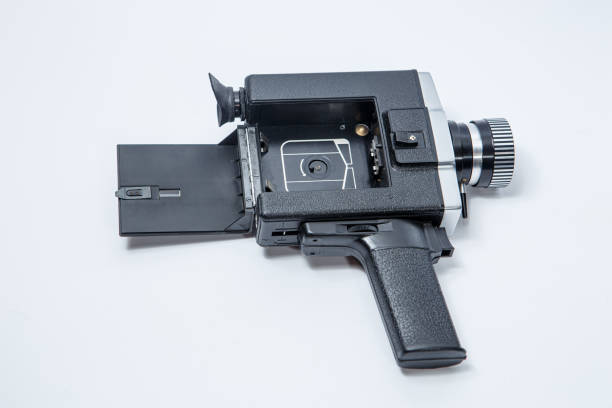 istock Old 8 mm movie camera on a white background 1194121672