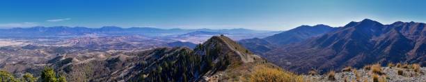 istock Wasatch Front Rocky Mountain landscapes from Oquirrh range looking at Utah Lake during fall. Panorama views near Provo, Timpanogos, Lone and Twin Peaks. Salt Lake City. United States. 1194121910
