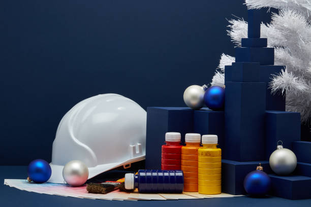 istock Construction hard hat, colour guide, Christmas decorations. Christmas and New Year construction 1194122992