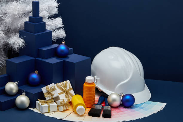istock Construction hard hat, colour guide, Christmas decorations. Christmas and New Year construction 1194123030