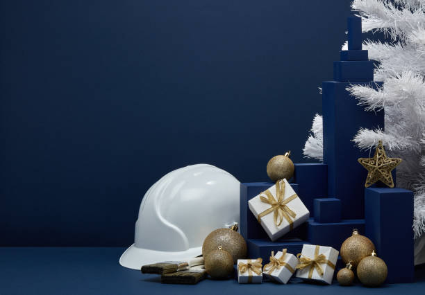 istock Construction hard hat and Christmas decorations. Christmas and New Year construction 1194123059