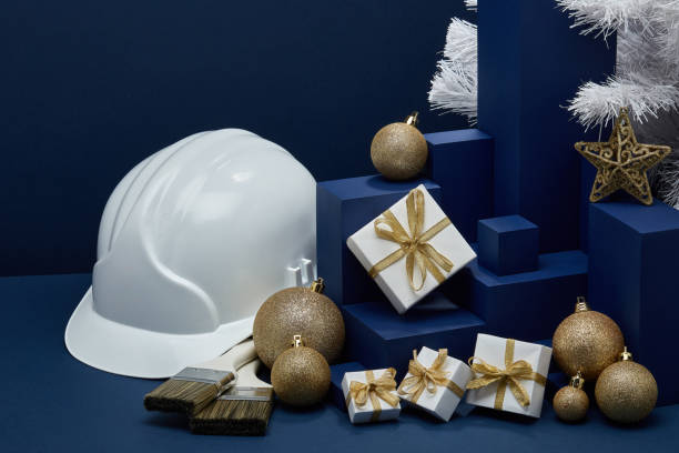 istock Construction hard hat and Christmas decorations. Christmas and New Year construction 1194123071