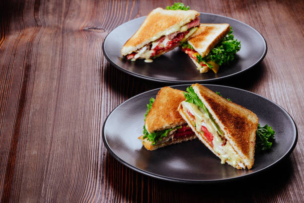 istock Sandwich bread tomato, lettuce and yellow cheese 1194123152