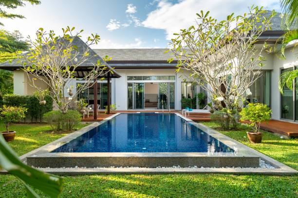 istock swimming pool and pavilion with green garden 1194125045