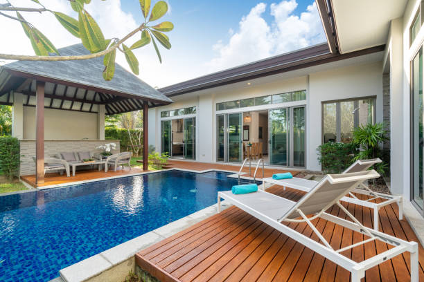 istock swimming pool and pavilion with green garden 1194125120
