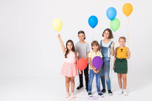 istock Children with balloons 1194126671