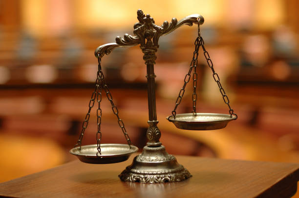 Symbol of law and justice , decorative Scales of Justice Symbol of law and justice in the empty courtroom, law and justice concept. scale of justice stock pictures, royalty-free photos & images