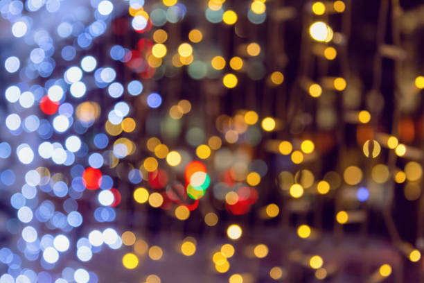 istock Bright glowing background with beautiful bokeh. Defocused background with blinking lights. Holidays concept. 1194130142