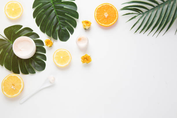 istock Creative hipster tropical leaves and orange fruit background with copy space on bright background. Tropical concept. 1194136219