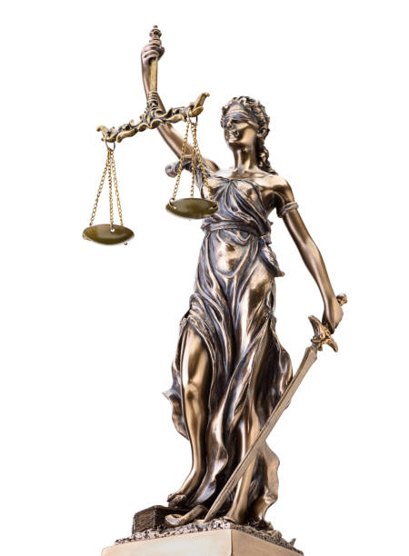 istock Statue of justice isolated on white background 1194138918