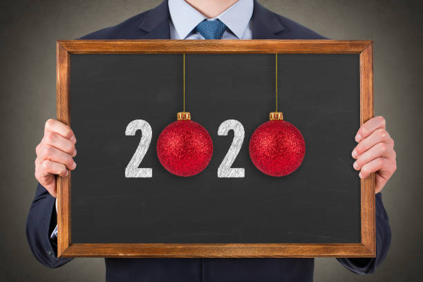 istock New year concepts 2020 on Chalkboard Background 1194140421