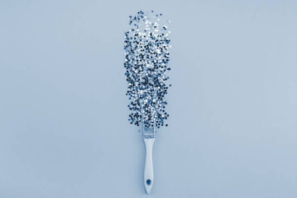 istock Surreal Paint brush drawing silver stars confetti 1194143024