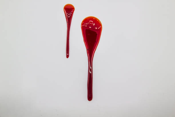 istock a blood flowing down. Bloody background 1194144941