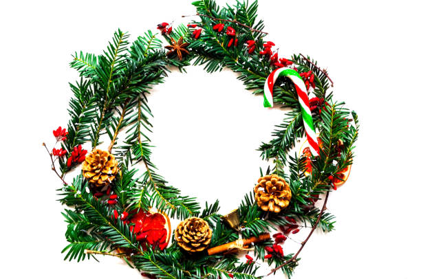 istock Handmade Christmas wreath on a white isolated background. Copy space 1194146245
