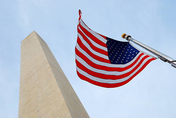 istock National flag and George Washington Monument. 119414659