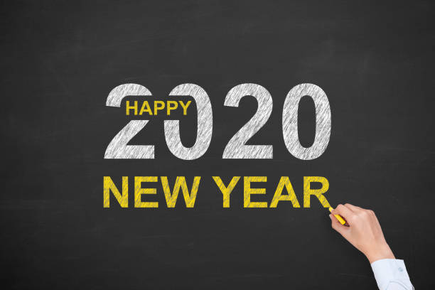 istock Happy New Year 2020 on Chalkboard Background 1194147706