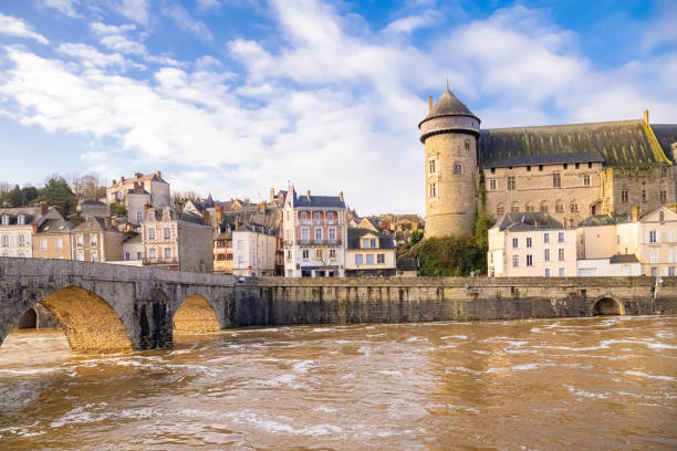 Laval, beautiful french city, panorama of the river and typical houses in the ancient center