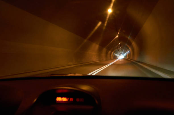 istock Car in a tunnel 1194151154