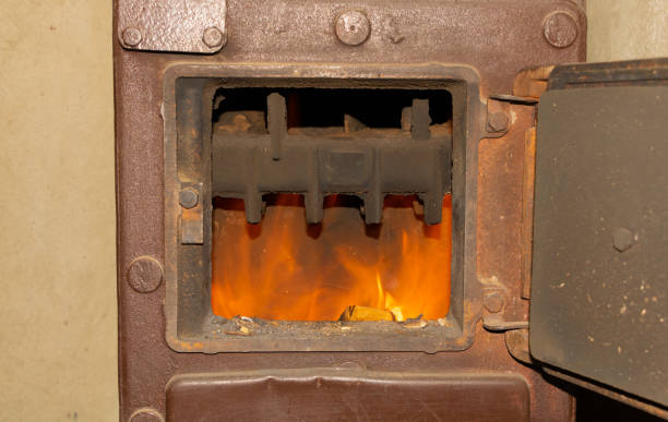 istock The fire burns in the stove winter home heating concept 1194151391