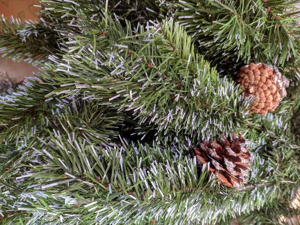 istock Bumps on a green artificial Christmas tree. texture 1194152399