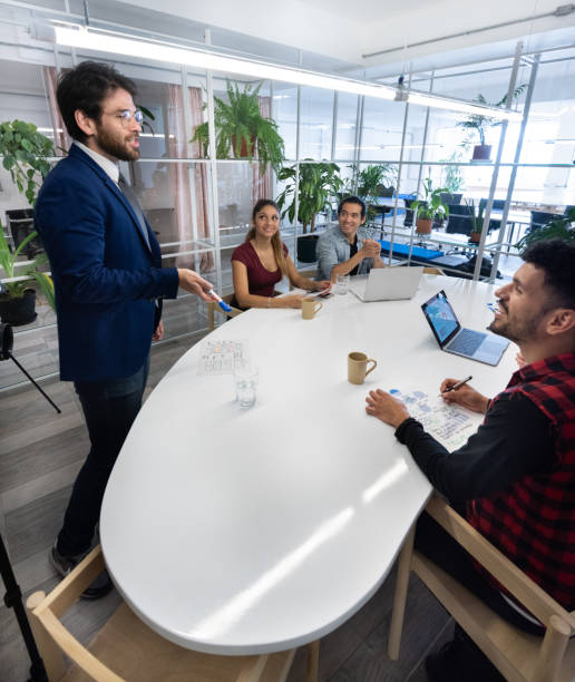 istock Multi ethnic business team meeting 1194156767