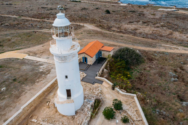 istock Paphos Lighthouse, Cyprus, aerial view from drone. Located in Paphos archeological park on mediterranean seaside or coast, built in 1888 1194156813
