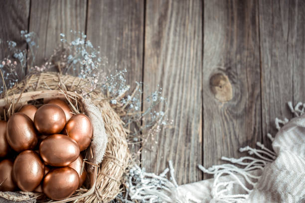 istock Background with Golden Easter eggs on wooden background. 1194156893