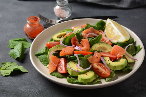istock Mediterranean Avocado Salmon Salad 1194157825