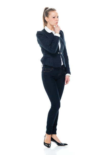 istock Full length / side view / profile view / front view / looking at camera / one person of 20-29 years old adult beautiful brown hair / ponytail caucasian female / young women business person / businesswoman standing with hand by side 1194160720