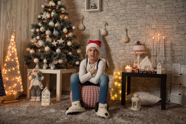 istock Cute Little Boy In Santa Hat 1194166503