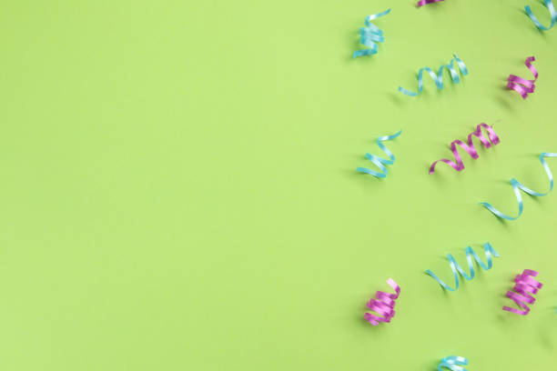 istock Serpentine on green  background. Celebration concept .Flat lay, top view, copy space. 1194166808