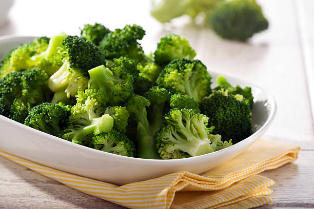 steamed broccoli  steamed stock pictures, royalty-free photos & images
